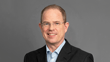 Picture of Nick Fowler against gray background