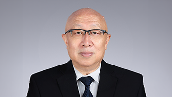 Picture of Wei-Zhao against gray background